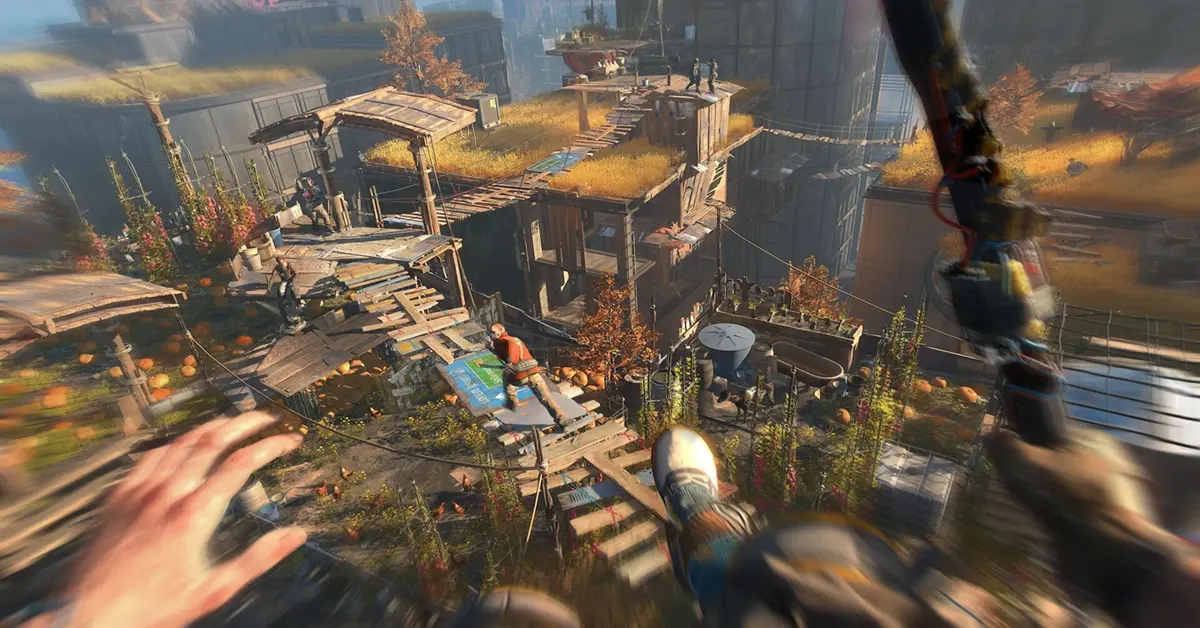 Ein einsamer Überlebender blickt bei Sonnenuntergang über eine zerstörte, überwucherte Stadtlandschaft in Dying Light 2.