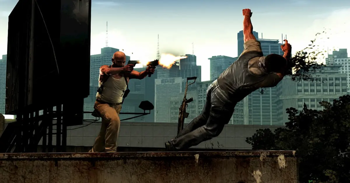 Max Payne springt in einer Favela in Zeitlupe durch die Luft und feuert mit zwei Pistolen.