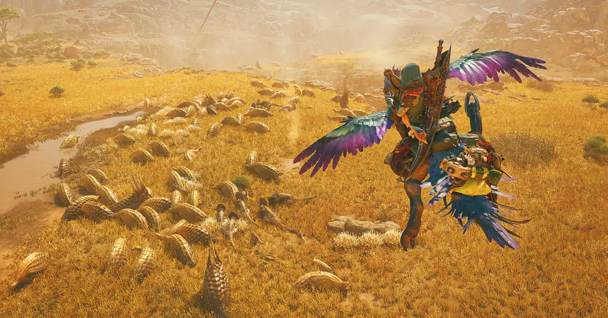 Ein furchtloser Jäger reitet auf einem Seikret-Reittier und weicht einem riesigen Monster in Monster Hunter Wilds aus